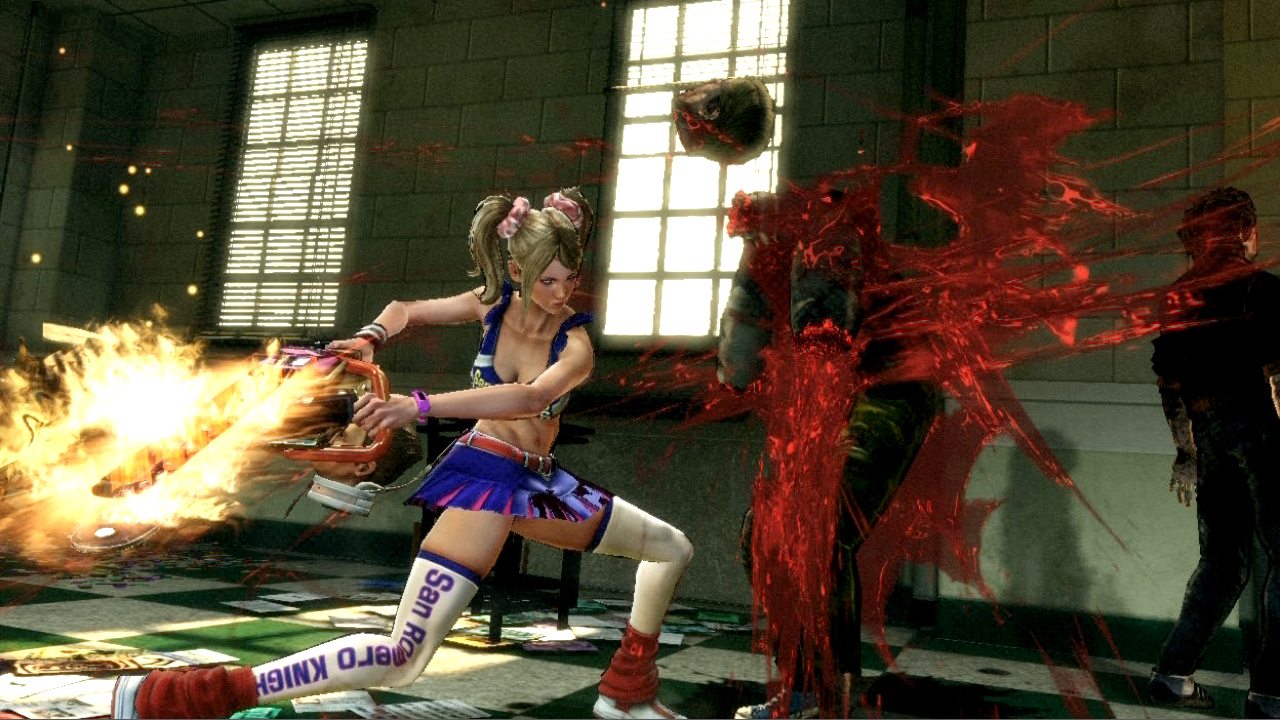 Juliet hacks away at a zombie in Lollipop Chainsaw